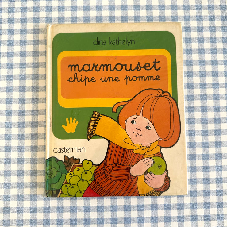 Livre marmouset chipe une pomme